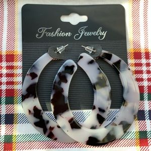 Circle Cow Print Earrings.